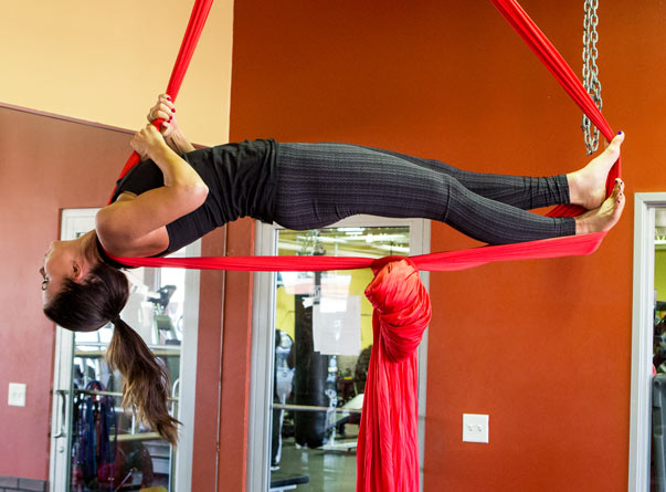 Jenna doing aerial yoga